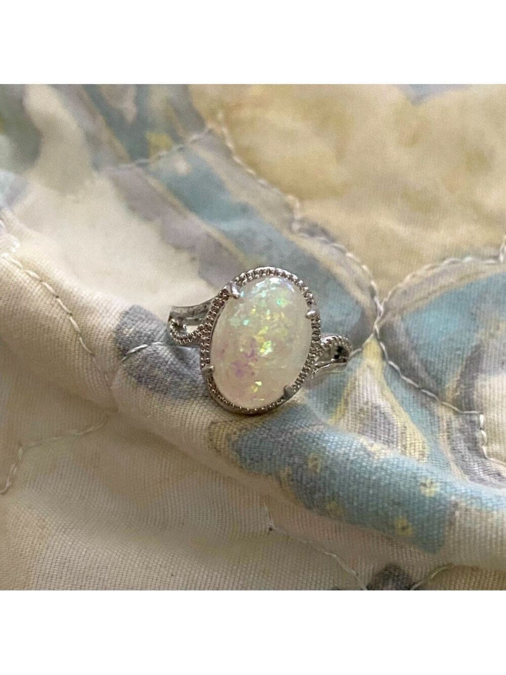 Pretty silver ring with simulated Opal stone
